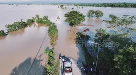 Drone video shows road submerged by Typhoon Toraji flood in the Philippines