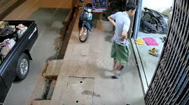 Large log flies off truck into front of house