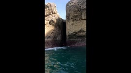 Paddle surfer’s narrow escape in wild crevice waves