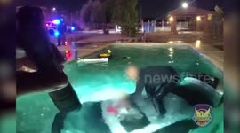 Moment Phoenix police officer rescues man trapped in car submerged in pool