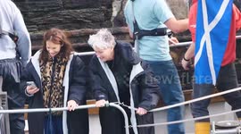 Actors Emma Thompson and Ruth Wilson entertained by a wild seal after filming