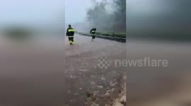 Rescue teams battle floods in Catania, Italy