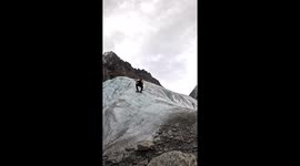 Terrifying Moment Mountaineer Slides Off Ice Cliff During Training