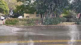 US, Los Angeles: Fontana Major Flooding Affects Roadway After Downpour