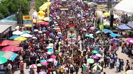Thai Buddhists celebrate Ghost Festival with large masks on floats
