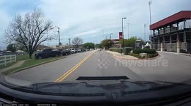 Car turns left into oncoming traffic and crashes head on into another car by Texas State University campus