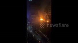 Lebanon: Beirut residents put out a fire in a building after an Israeli airstrike