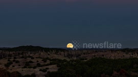 Full moon, Beaver moon rising over the Arbuckle mountains