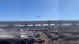 US, Los Angeles: Pomona Small Plane Crash at NHRA Races Caught on Tape UGC Licensed Footage