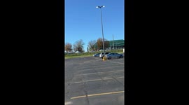 Police chase unfolds in parking lot
