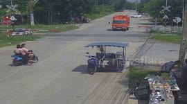 Oncoming train crashes into car and sends it spinning upon impact