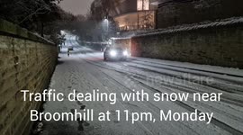 Daredevils filmed sledging down alleys and hurling snowballs amid flurries