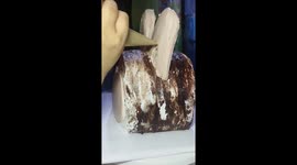 Watch this baker make Labubu-shaped cake