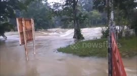 Guatemala: Rising River Levels Collapse Key Bridge in Peten