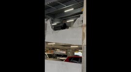Car falls from seventh level of parking tower in Guatemala City