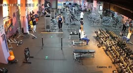Fitness enthusiast falls while jumping on horizontal bar during training
