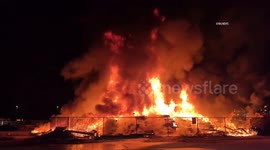 US, Bakersfield: Wasco Large Stack Of Railroad Ties On Fire