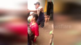 Police save family and pet dog from floods in Honduras