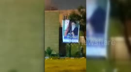 Iran: Iranian Protesters Burn Ali Khamenei's Banner Amid Unrest
