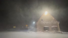 Snow blasts homes in Washington as temperatures fall