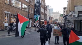 Palestinian Protesters boycott Coca Cola Christmas truck at Truman Brewery on Brick Lane, London