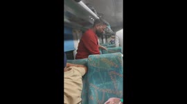 Snake emerges in train carriage causing panic in India