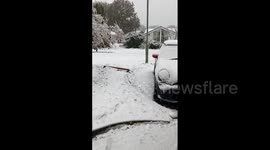 UK: Heavy Snowfall Causes Disruptions Across Devon