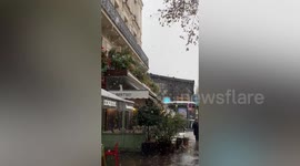 Snow falls in Paris as winter arrives in French city