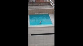 Exclusive- Young boy’s tarp pool run in Brazil sparks mixed reactions