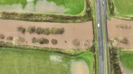 Storm Bert Flood With Passing Traffic - Drone Footage