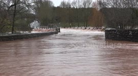 Storm Bert:- River Trothy Overflows at Trothy Bridge, Monmouth, Monmouthshire.