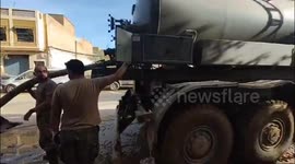 Rescue teams clear mud from floods in Valencia, Spain