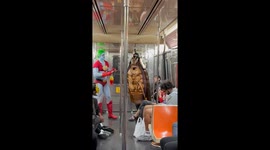 Halloween costumes on a New York subway train