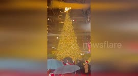 Fox News turns on Christmas tree lights outside office in New York