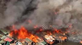 Fire destroys shanty town leaving thousands homeless in the Philippines