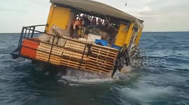 Ferry sinks while carrying tourists from island in Cambodia