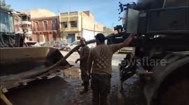 Spain: Rescue Teams Clear Vehicles and Mud from Garages in Cataraoja After Devastating Flooding
