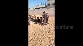 On World Children's Day, displaced children in Gaza create their own toys from the remnants of bombing and destruction