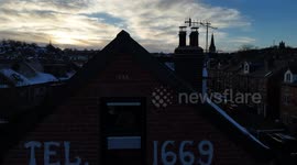 Estrella job - Bar manager inspired by pint glasses lettering to restore ghost sign