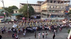 Car reverses into dancers during festival in the Philippines