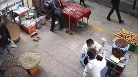 Flowerpot falls on child and narrowly misses his head