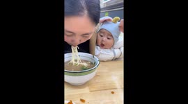 Seven-month-old child opens mouth for food in Jiangsu