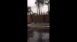 Person slips and falls while attempting to jump into a pool in Argentina