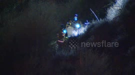 US, Los Angeles: Malibu Vehicle Over The Side Cliff Rescue