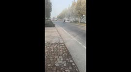 Chinese couple rescues person from burning car
