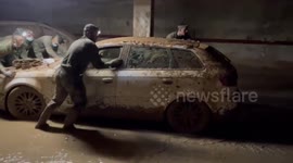 Rescue teams clear flood debris from Paiporta, Spain