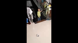 Chinese boy defies medics and climbs stairs unaided