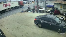Truck veers off road after avoiding motorcyclist in China accident