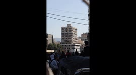 Israeli air strike targets a commercial and residential building in Beirut
