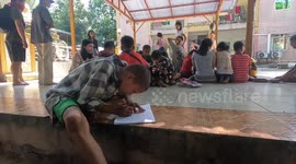 Young volunteers bring education to street kids in Yangon, Myanmar